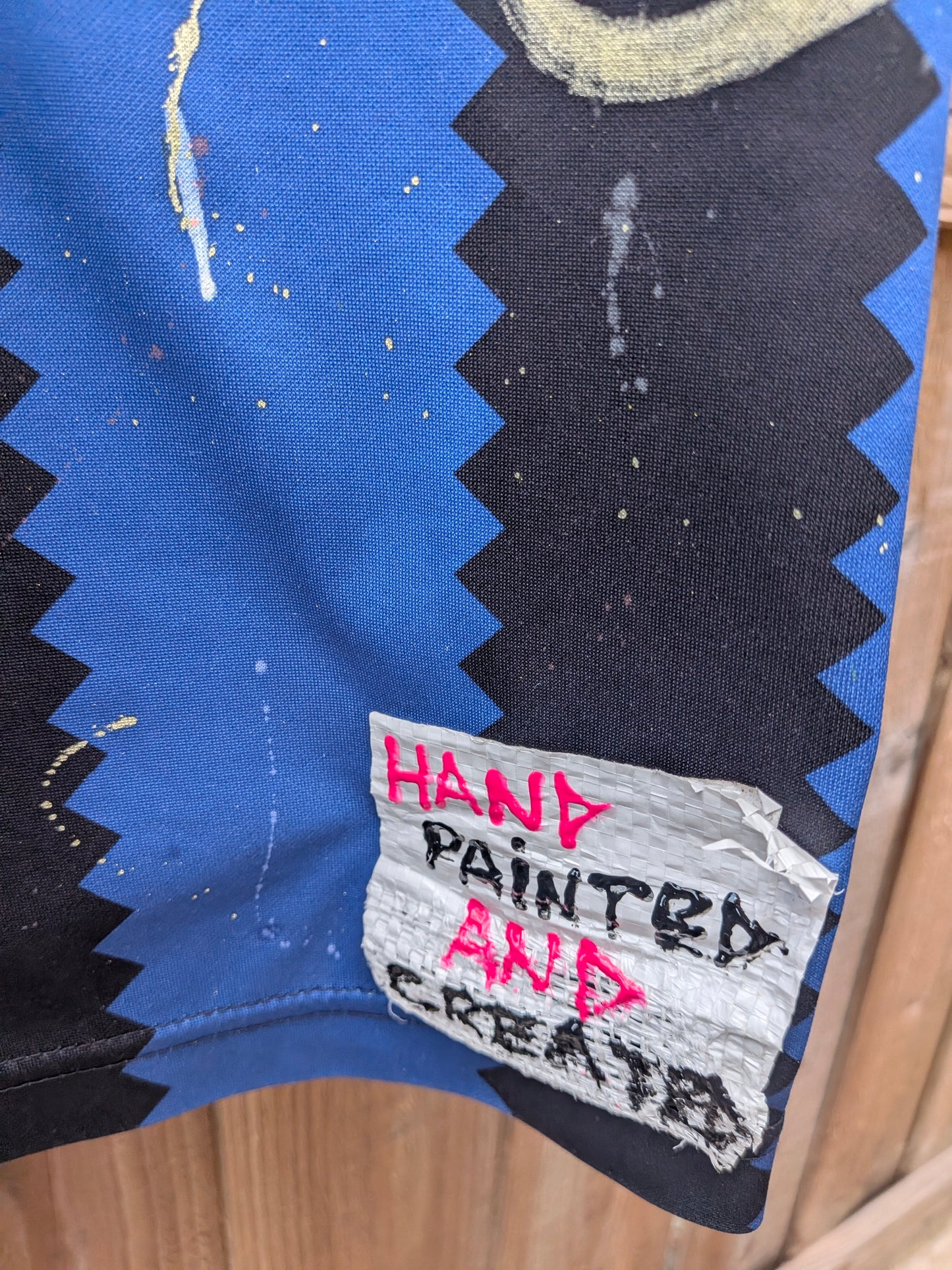 False Positive by Core Sway Hand Painted & Upcycled Football Shirt