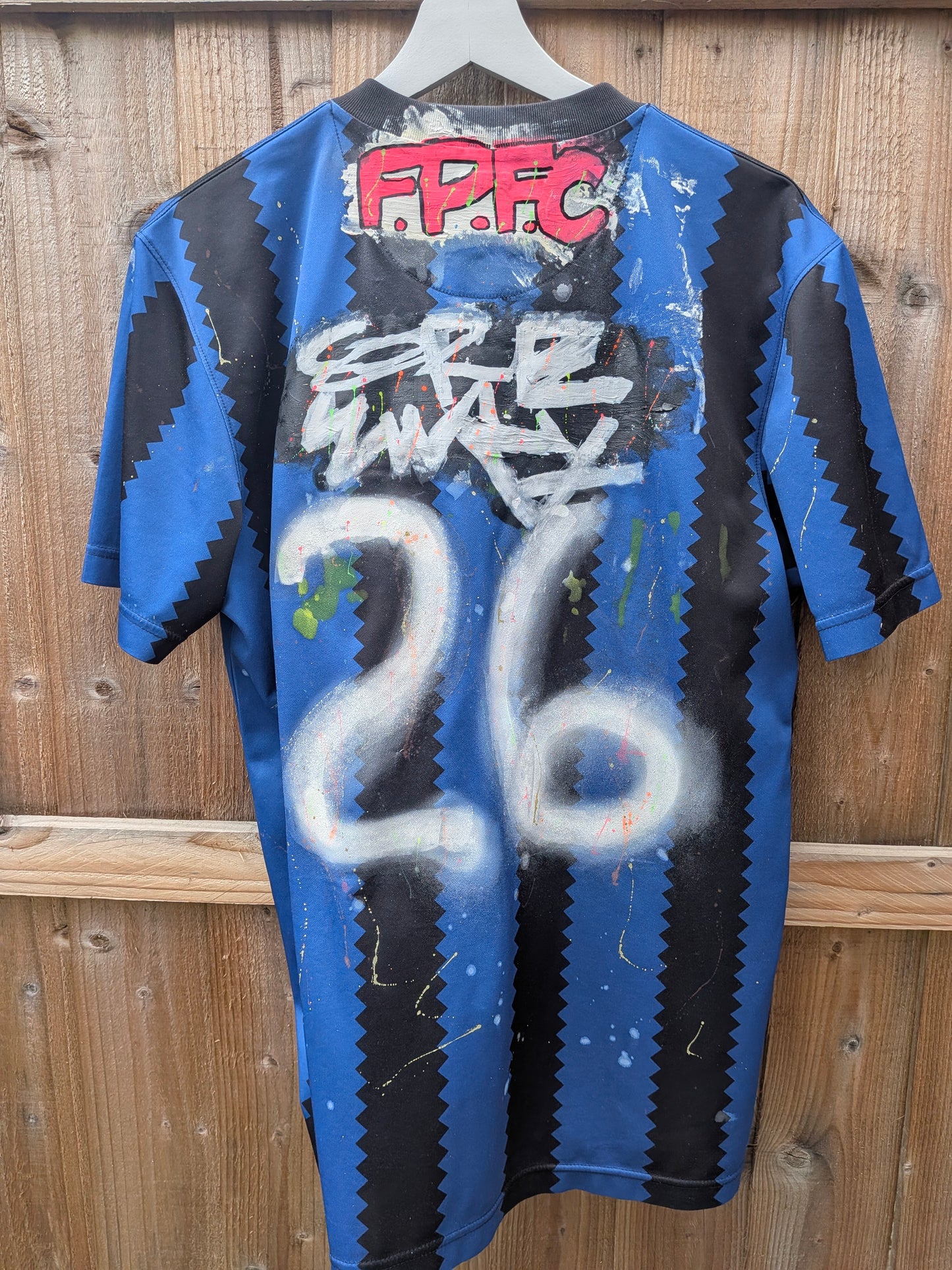 False Positive by Core Sway Hand Painted & Upcycled Football Shirt