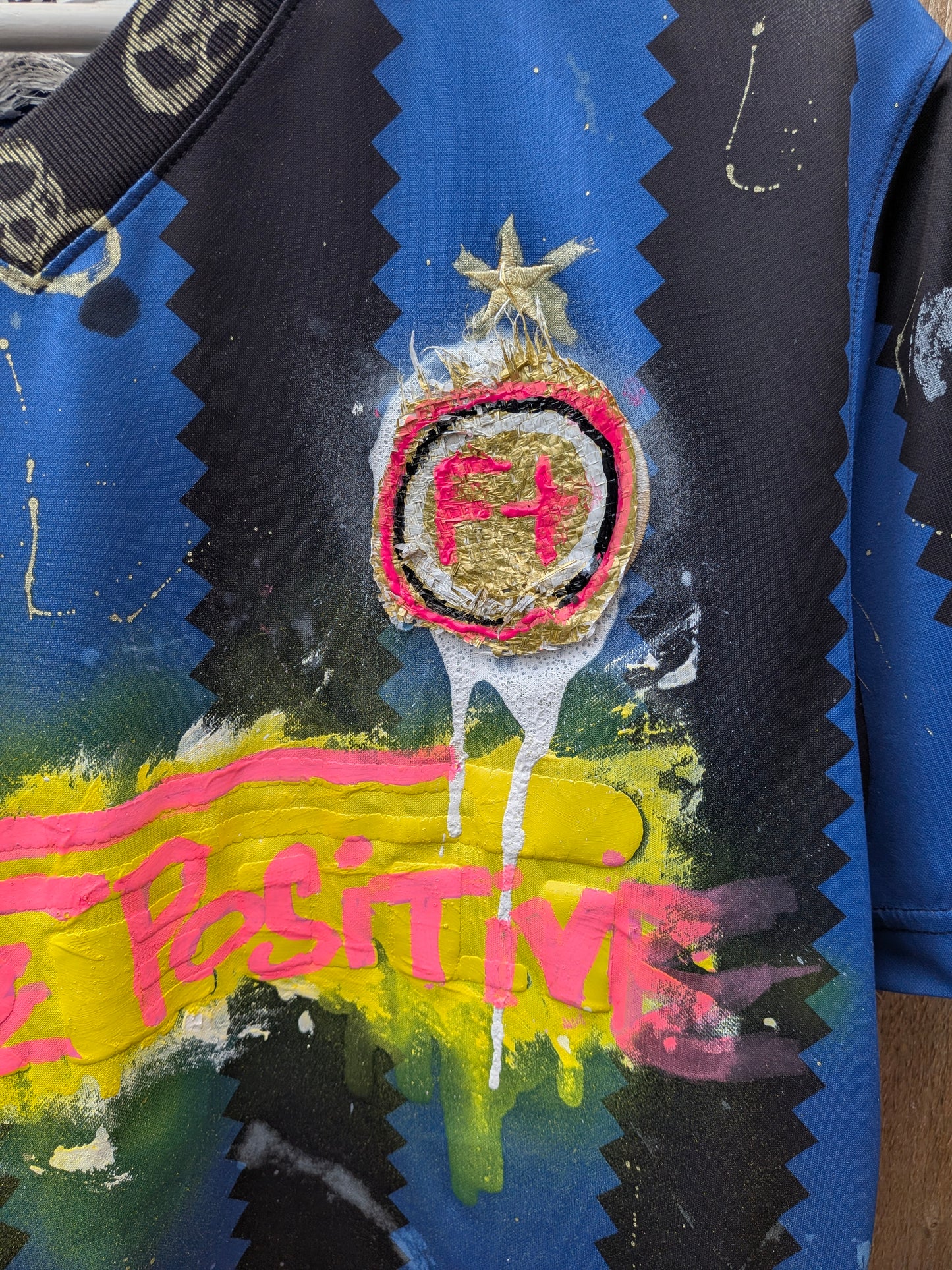 False Positive by Core Sway Hand Painted & Upcycled Football Shirt