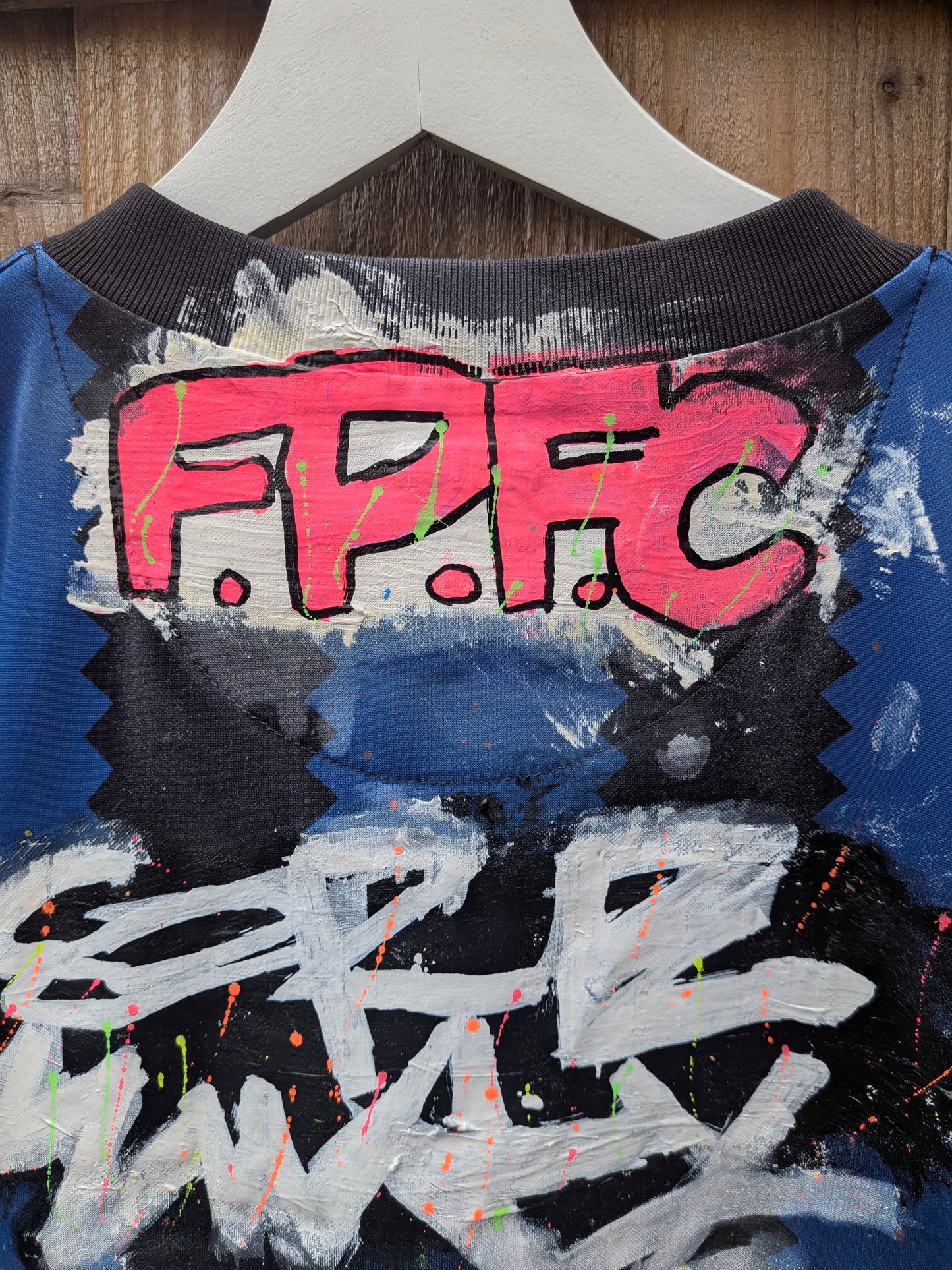 False Positive by Core Sway Hand Painted & Upcycled Football Shirt