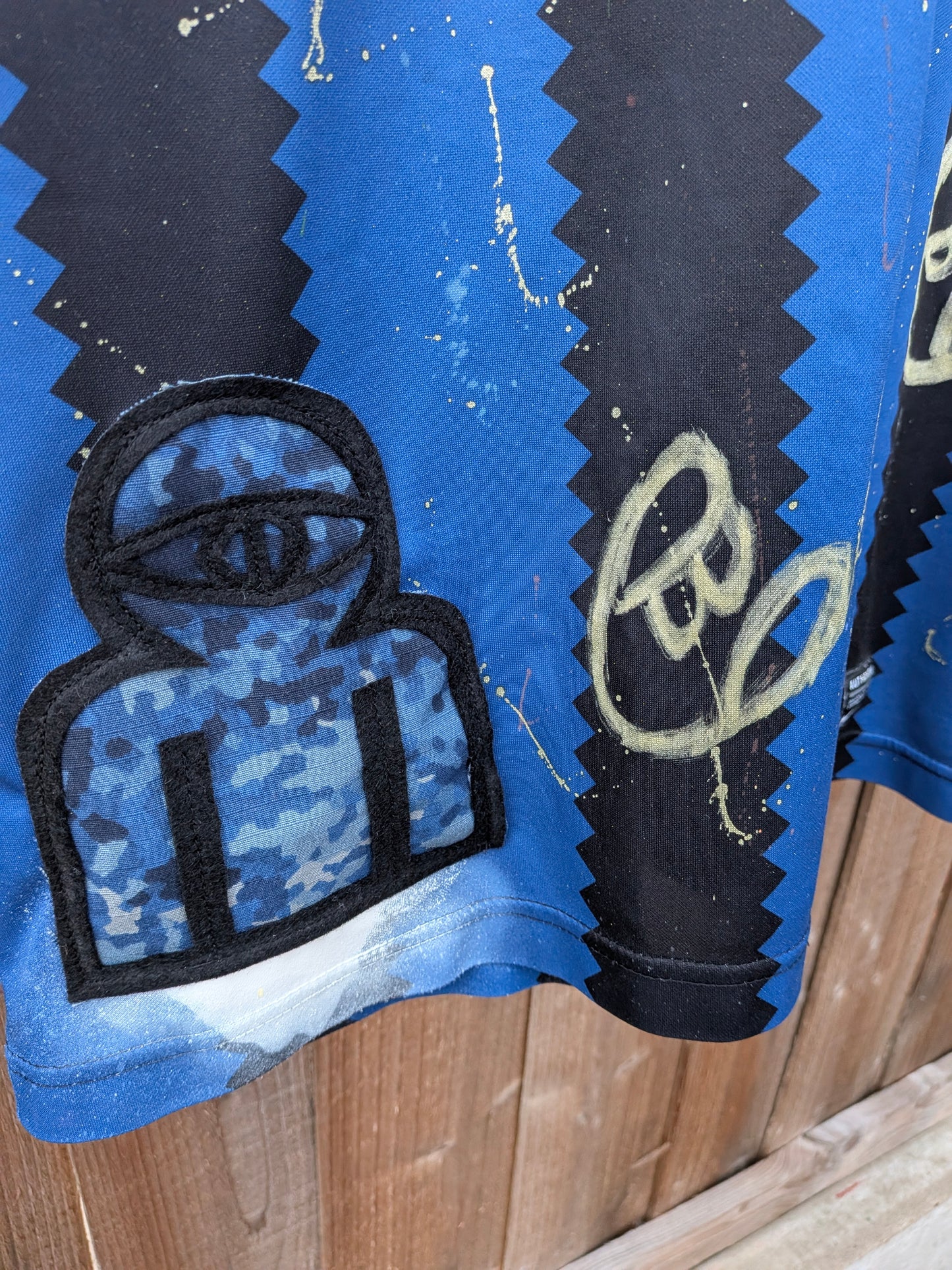False Positive by Core Sway Hand Painted & Upcycled Football Shirt